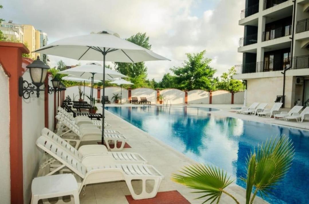 Apart Sun Travel Pantai Sunny Bagian luar foto